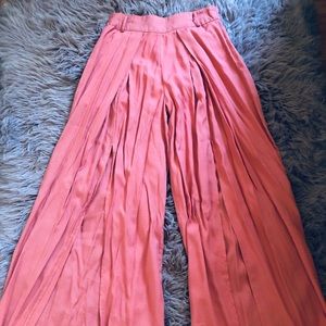 Tangerine flowing pants with slit leg